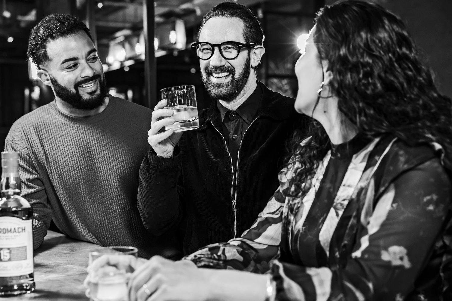 An image of people enjoying Benromach 15 Years Old in the bar An image of people enjoying Benromach 15 Years Old in the bar